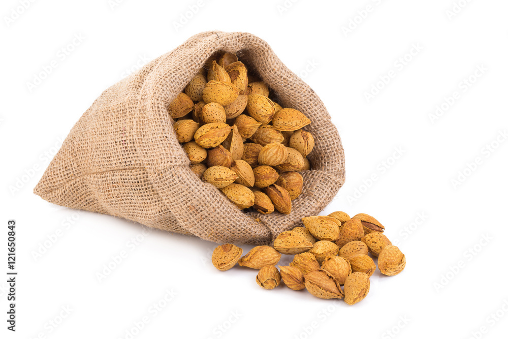 Almond nut in shell and shelled isolated on white background