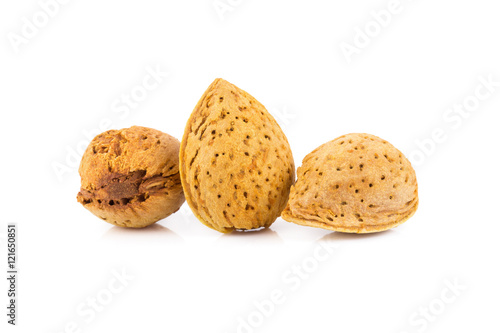 Almond nut in shell and shelled isolated on white background