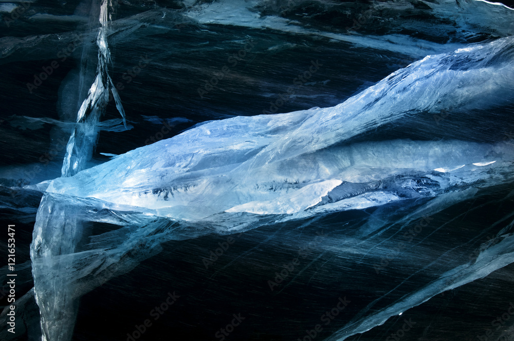 Obraz premium Winter. Extremal cracks on Ice of Lake Baikal. thickness of about one meter. . Ice storm. the crystal clear frozen water. Used toning of the photo. 