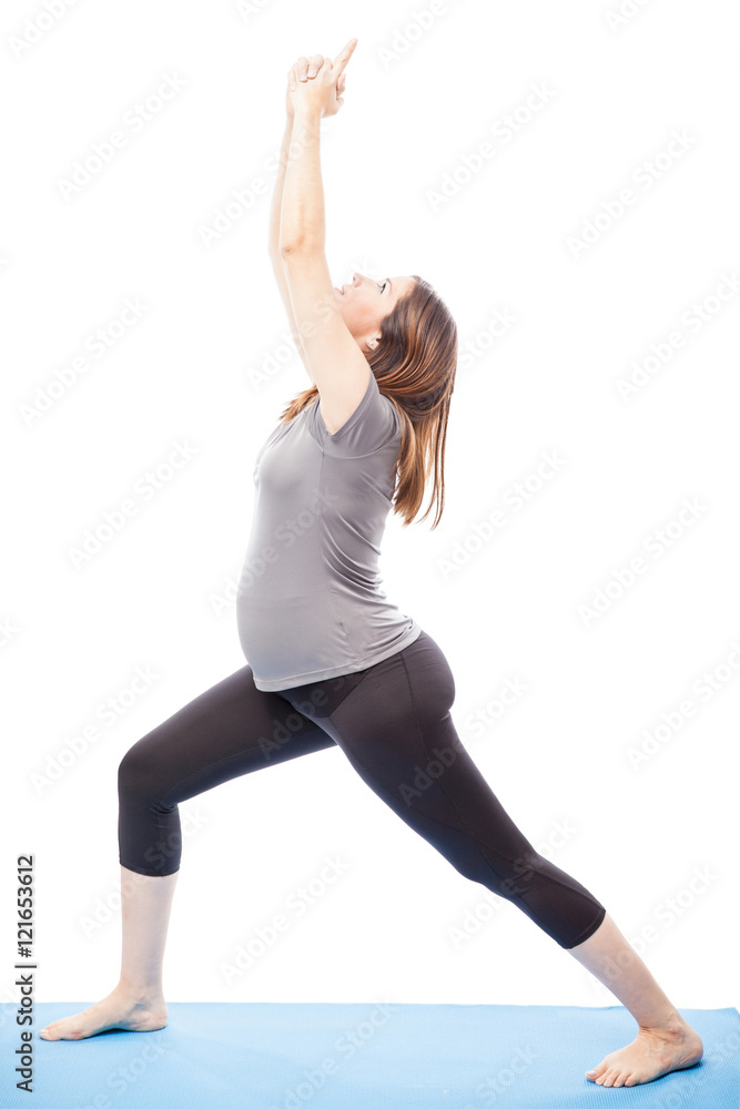 Pregnant woman doing some yoga