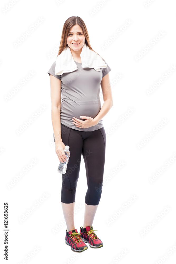 Pregnant woman resting after running Pregnant woman resting after running