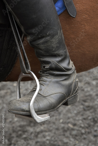 Riders safety stirrup September 2016 - A riding boot positioned into a bent leg safety stirrup used in horse riding