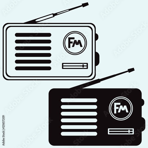 Old radio receiver. Isolated on blue background. Vector silhouettes