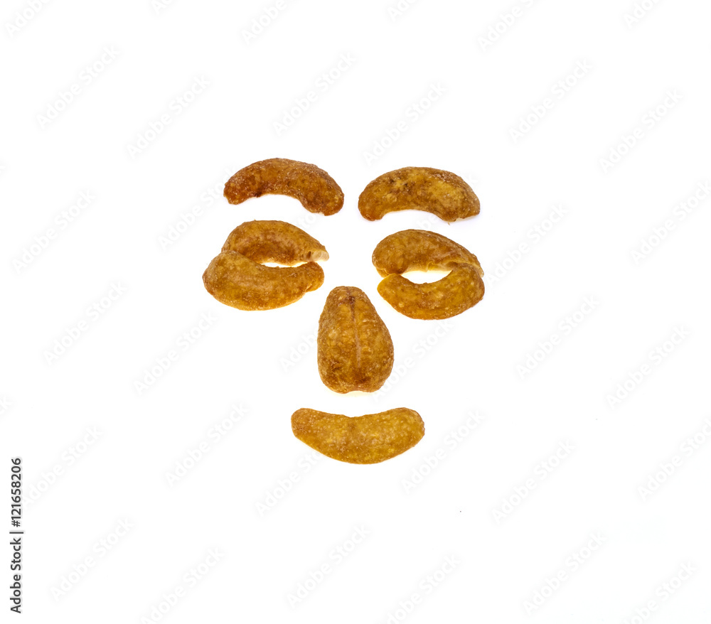 Salted and roasted Cashews nuts is snack.Isolate cartoon face.
