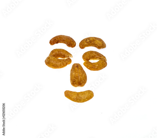 Salted and roasted Cashews nuts is snack.Isolate cartoon face.