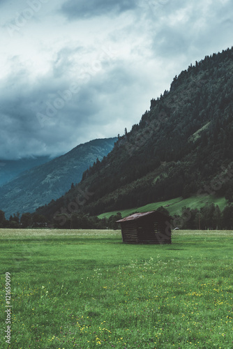 Wood cabin in mountain in A...