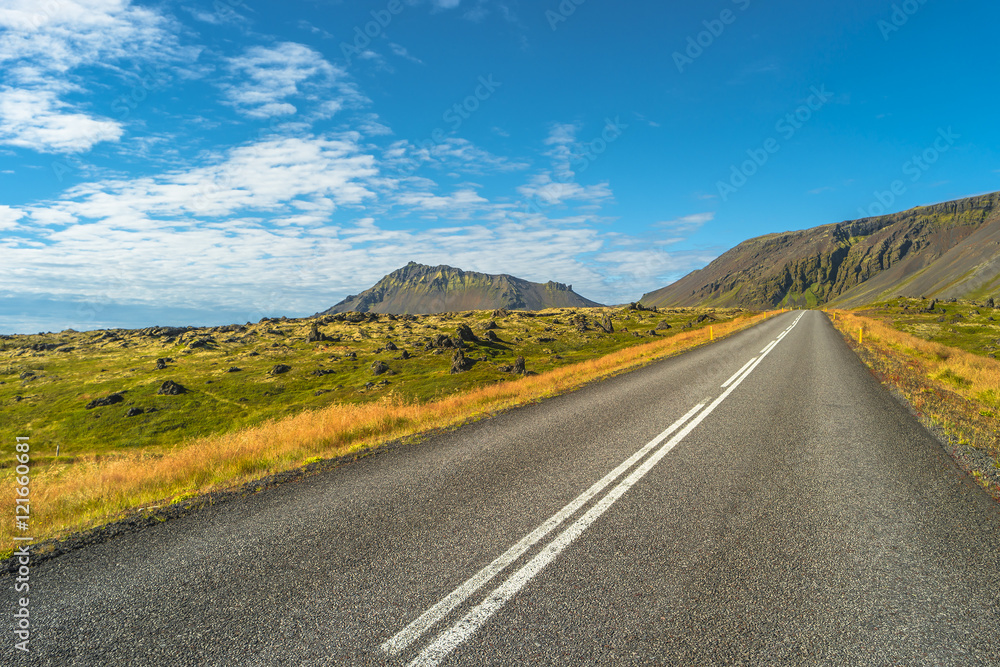 Isolated road and Icelandic colorful landscape at Iceland, summe