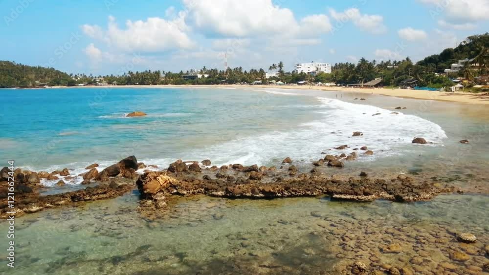 View on sand beach and foamy ocean waves coming ashore, tropical island vacation
View on sand beach and foamy ocean waves coming ashore, tropical island vacation