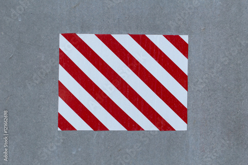 Danger zone sticker on concrete wall photo