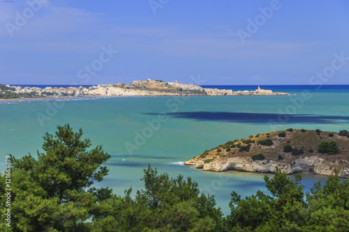 Gargano coast: bay of Vieste.-(Apulia) ITALY-In the foreground the island Gattarella and in the background the town of Vieste.