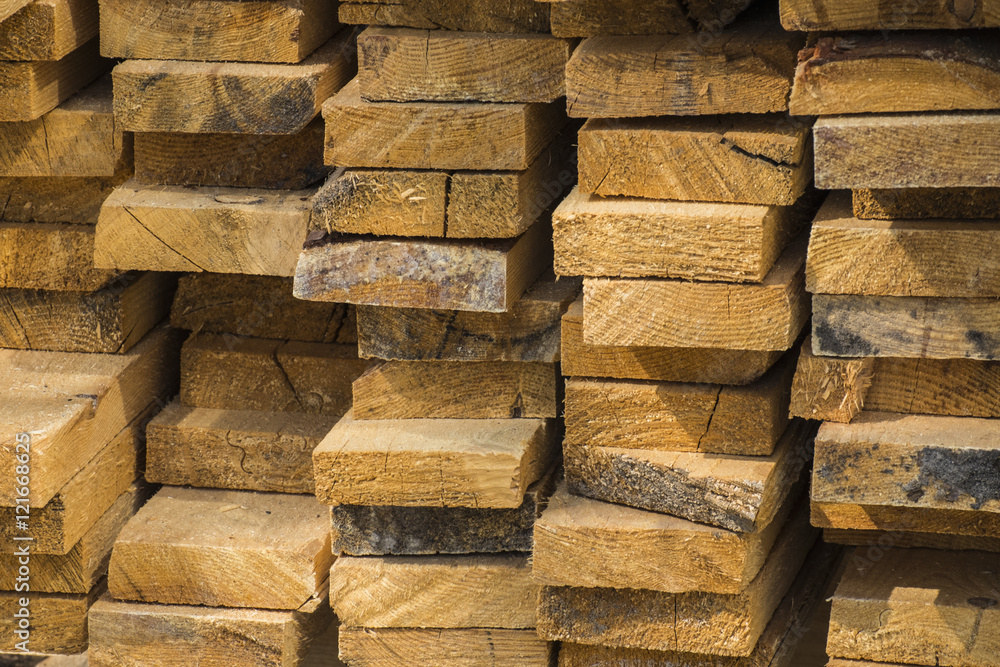 A stack of boards / The pack is not very neatly stacked pine boards A stack of boards / The pack is not very neatly stacked pine boards