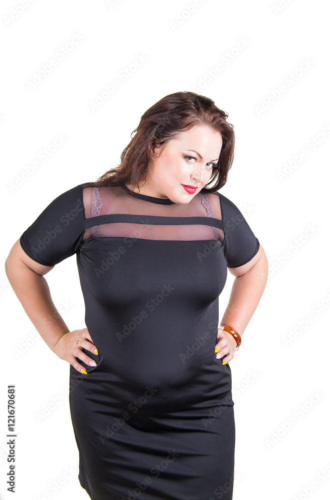 Portrait of beautiful chubby woman in little black dress on the