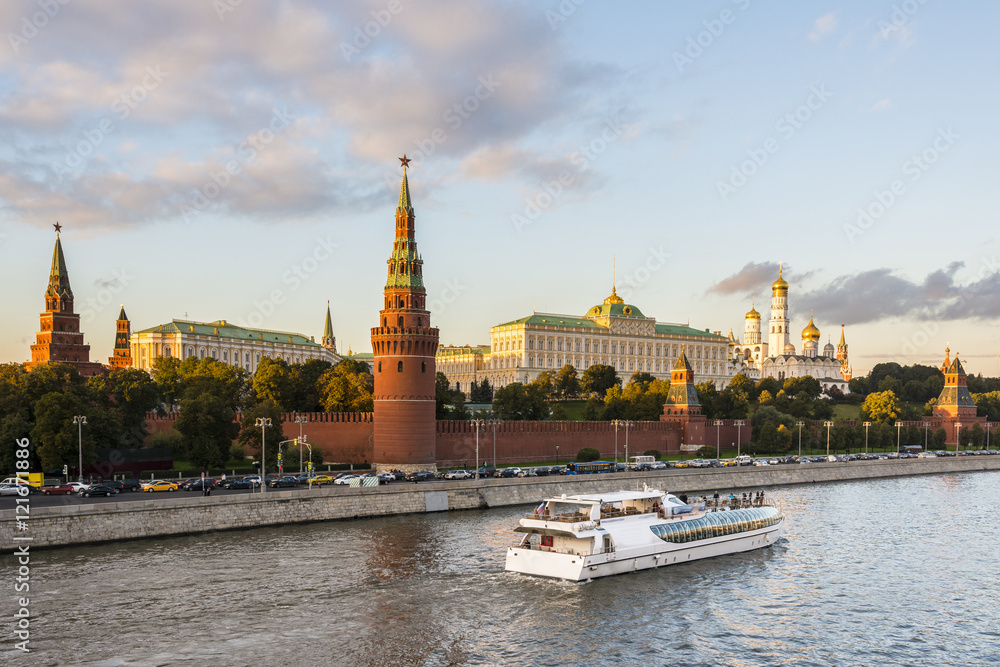 Cruise boat on the Moskva River in front of he Moscow Kremlin, Russia