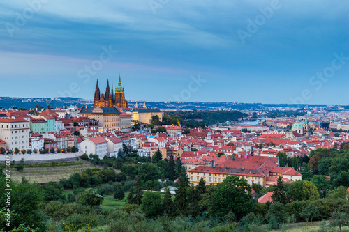 Evening summer Prague panorama from Prague Hill with Prague Castle, Vltava river and historical architecture. Concept of Europe travel, sightseeing and tourism.