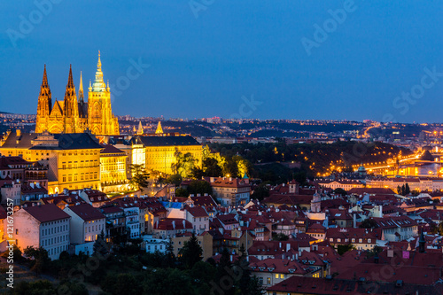 Evening summer Prague panorama from Prague Hill with Prague Castle, Vltava river and historical architecture. Concept of Europe travel, sightseeing and tourism. © daliu