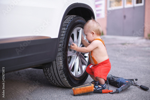 Little boy car mechanic