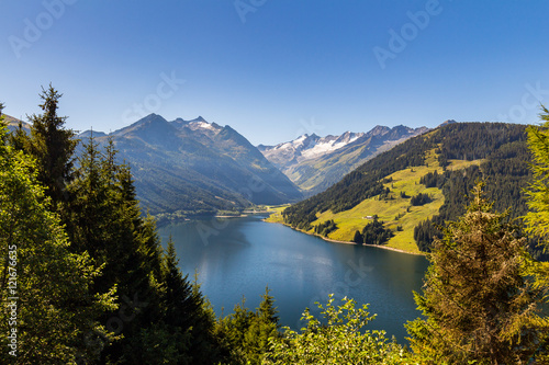 Fototapeta Naklejka Na Ścianę i Meble -  Amazing summer morning on the fantastic Speicher Durlassboden lake. Alps, Austria, Europe.