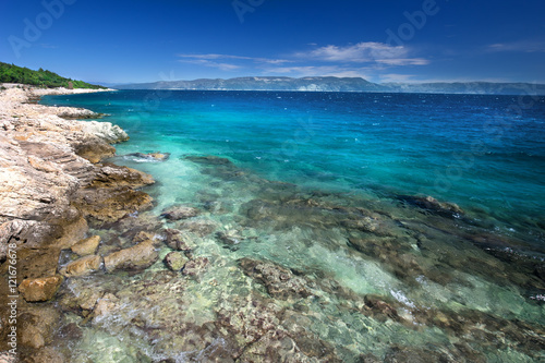 Amazing beach with cristal clean sea water with pine trees, Adriatic Sea, Istria, Croatia
