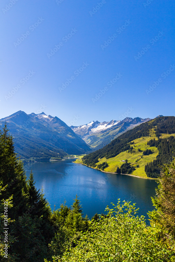 Summer sunny scene in the valley of Speicher Durlassboden lake in the Austrian Alps. View from Gerlos pass, Austria, Europe.