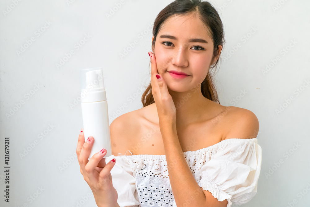Body lotion Portrait of Beautiful Woman looking at Camera. Beau Body lotion Portrait of Beautiful Woman looking at Camera. Beau