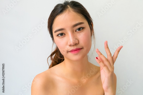 The Portrait of a beautiful female model on white background