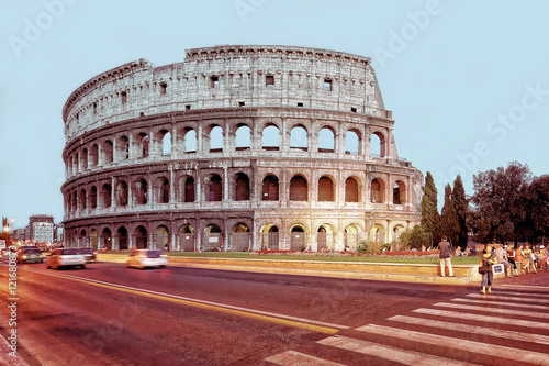 Colosseum in city center of Rome Italy in evening