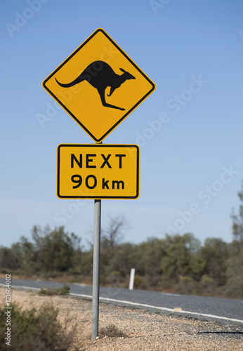 road sign kangaroos next 90km photo