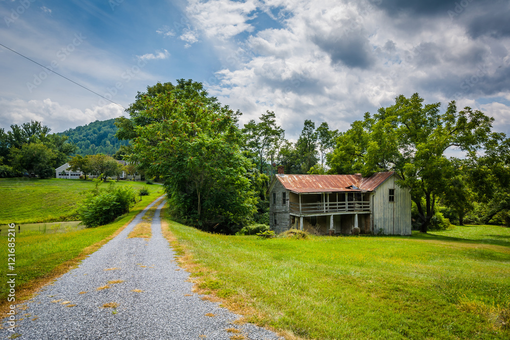 Abandoned buildings along a dirt road, in the rural Shenandoah V Abandoned buildings along a dirt road, in the rural Shenandoah V