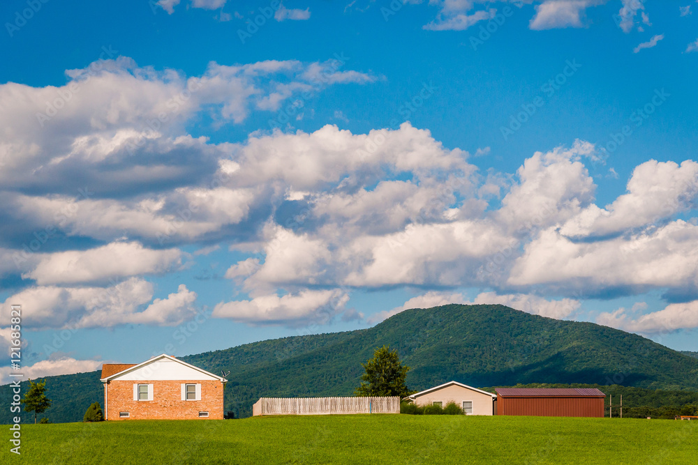 Houses and view of distant mountains in the rural Shenandoah Val