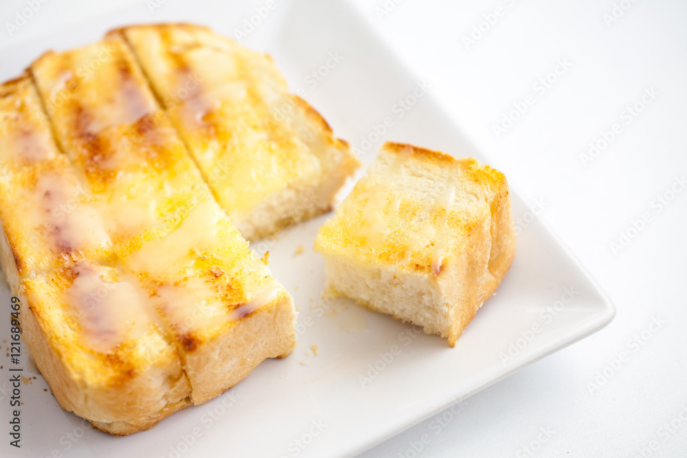 Bread toast and condensed milk with sugar