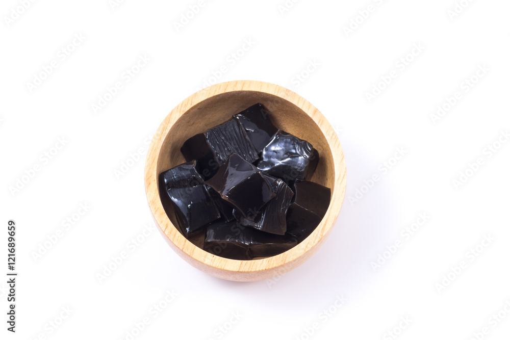Grass jelly in wooden bowl Grass jelly in wooden bowl