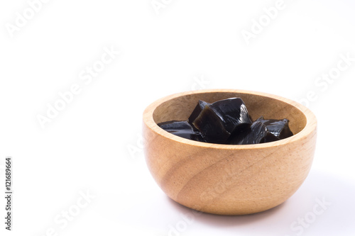 Grass jelly in wooden bowl