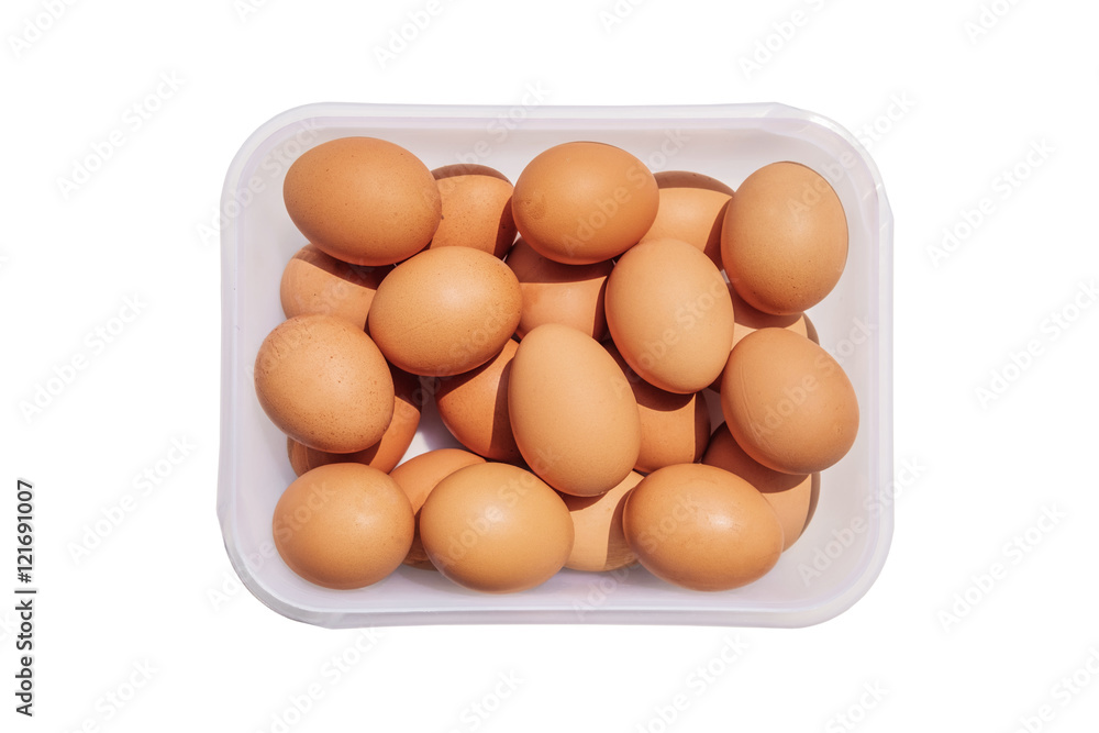 Chicken eggs in container, isolated on white background