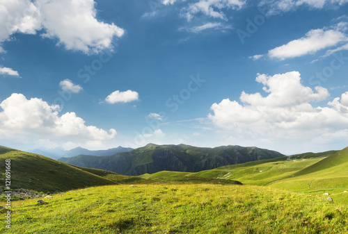 Pasture in mountain valley. Agriculture landscape in the summer time