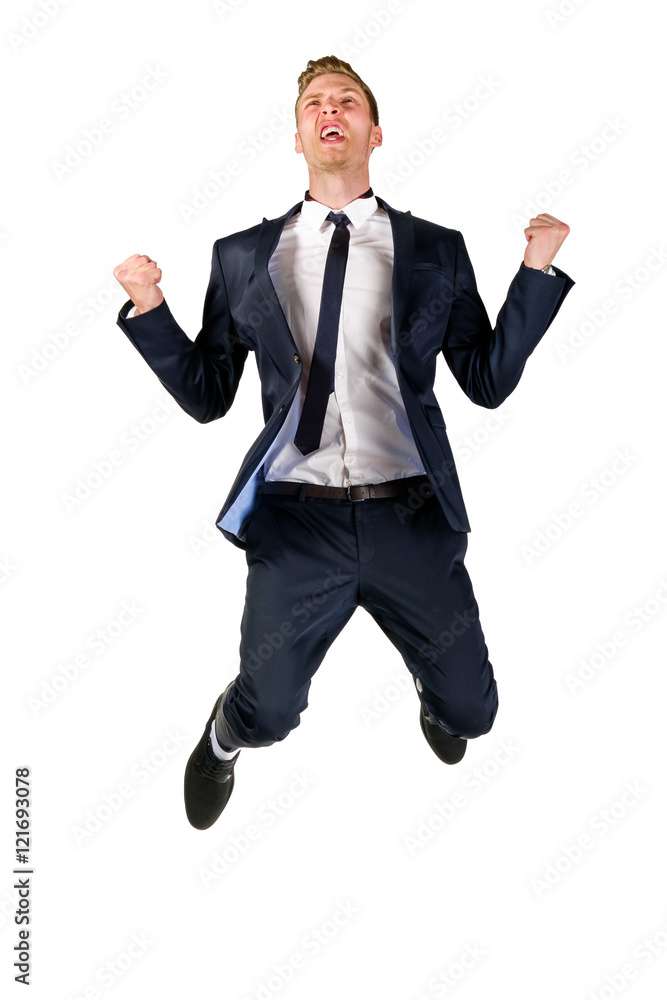 Happy young businessman in suit jumping isolated on white Happy young businessman in suit jumping isolated on white