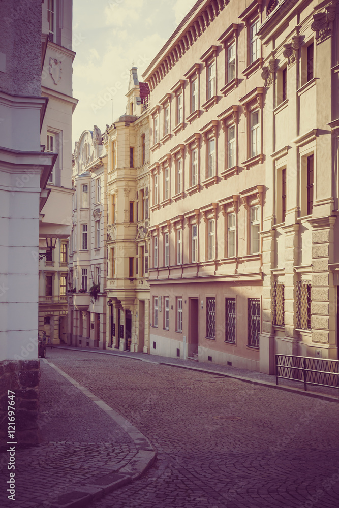 street with ancient houses in Czech republic Brno with vintage treatment