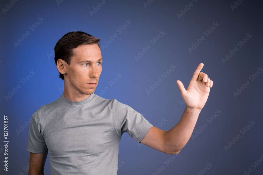 Man working with virtual touch screen. Man working with virtual touch screen.
