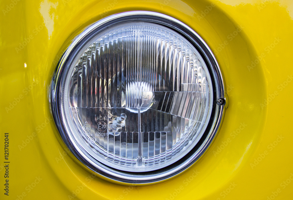 Close-up of car headlight.