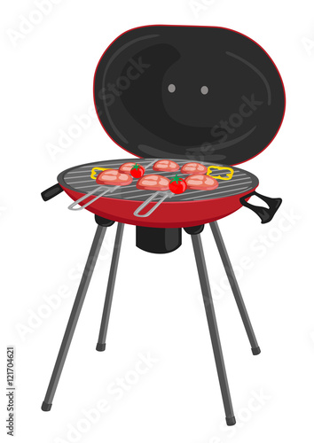 portable barbecue with meat, tomatos and peppers grilling over the coals