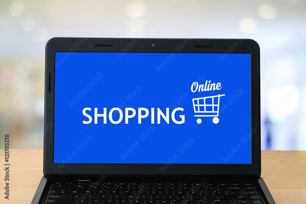 Laptop with shopping online device on screen Laptop with shopping online device on screen