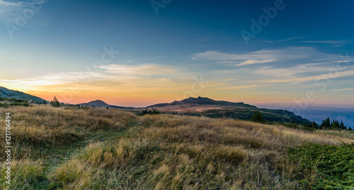 Minutes after sunset at Vitosha, Sofia, Bulgaria - amazing autumn panoramic image with warm colors and picturesque scenery