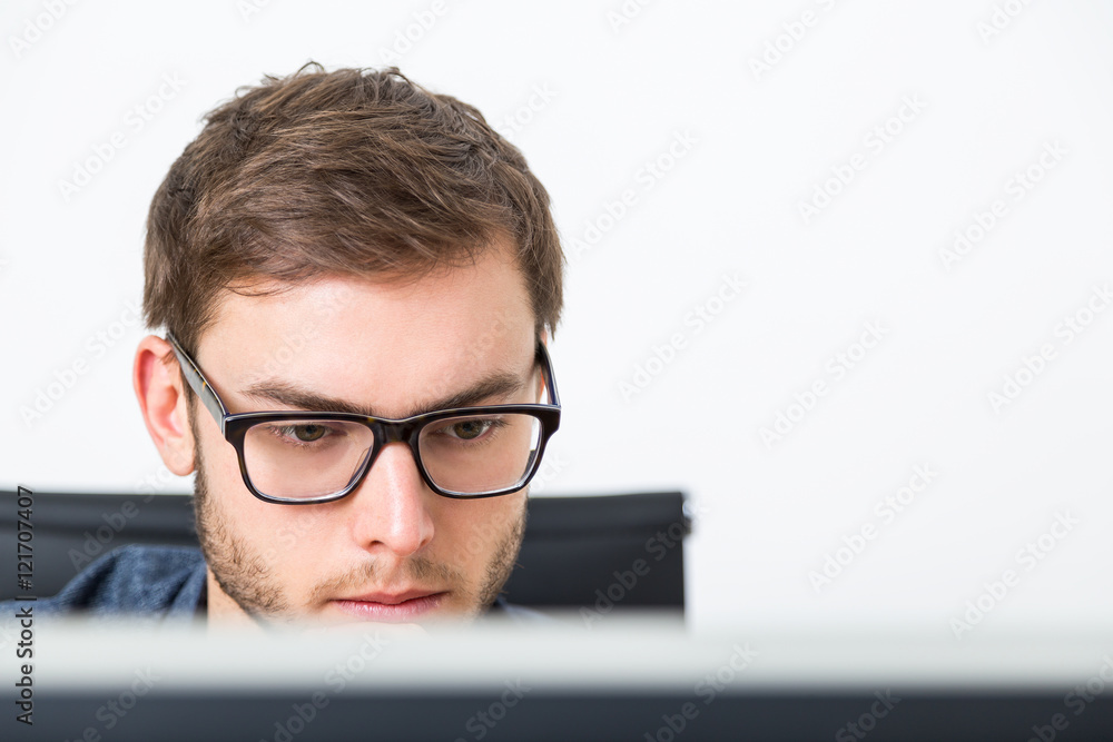 Man with beard in corporate office Man with beard in corporate office
