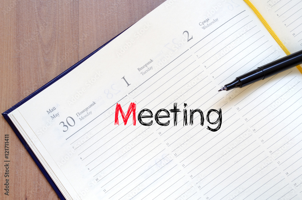 Meeting text concept on notebook Meeting text concept on notebook