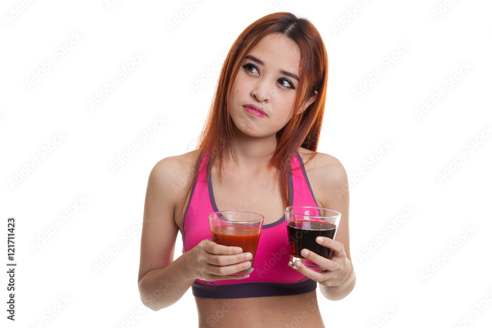 Beautiful healthy Asian girl with tomato juice and cola drinks. Beautiful healthy Asian girl with tomato juice and cola drinks.