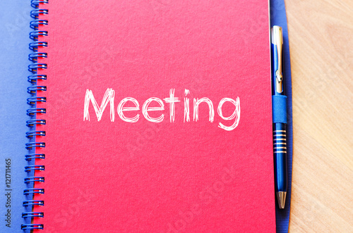 Meeting text concept on notebook