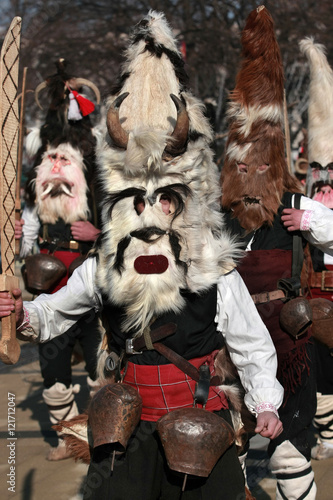 PERNIK, BULGARIA - JANUARY 30, 2016 - Masquerade festival Surva in Pernik, Bulgaria. People with mask called Kukeri dance and perform to scare the evil spirits