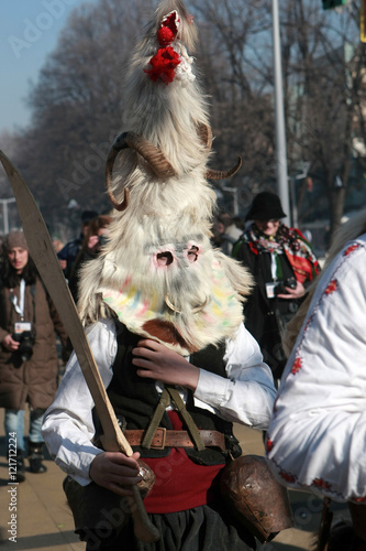 PERNIK, BULGARIA - JANUARY 30, 2016 - Masquerade festival Surva in Pernik, Bulgaria. People with mask called Kukeri dance and perform to scare the evil spirits