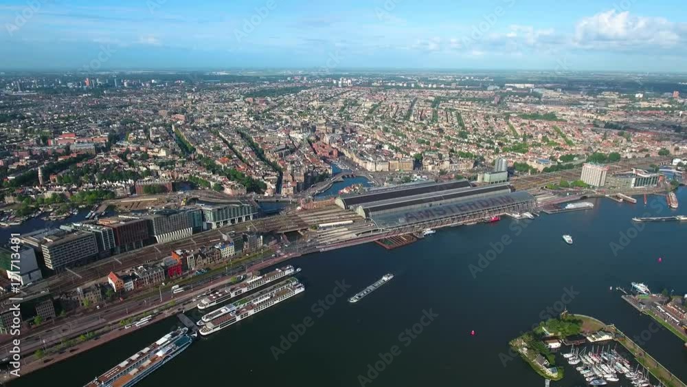 City aerial view over Amsterdam, The Netherlands. View from the bird's flight