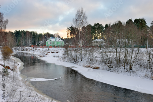 Winter snowy landscape on the river Oredezh photo