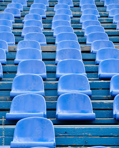 rows of empty seats in stadium